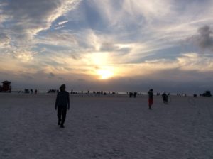 people walking on beach